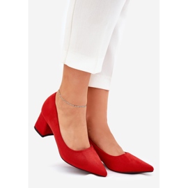 Women's pumps with pointed toes on the red post 1
