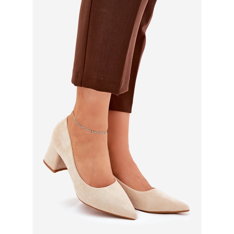 Women's pumps with pointed toes on the post beige 1