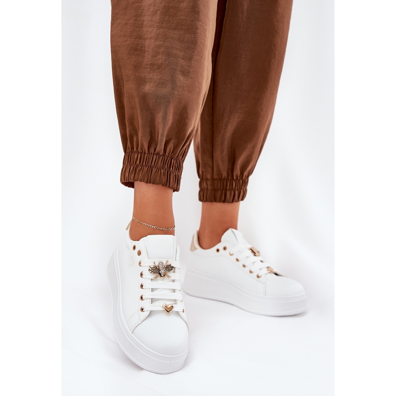 Women's sneakers on the platform with white pins 2