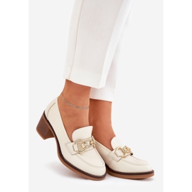Women's shoes with a golden detail with beige heels 1