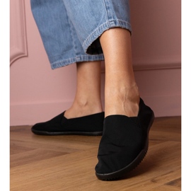 Black women's slip -up sneakers 1
