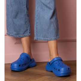 Blue built -up flip flops on the platform 1