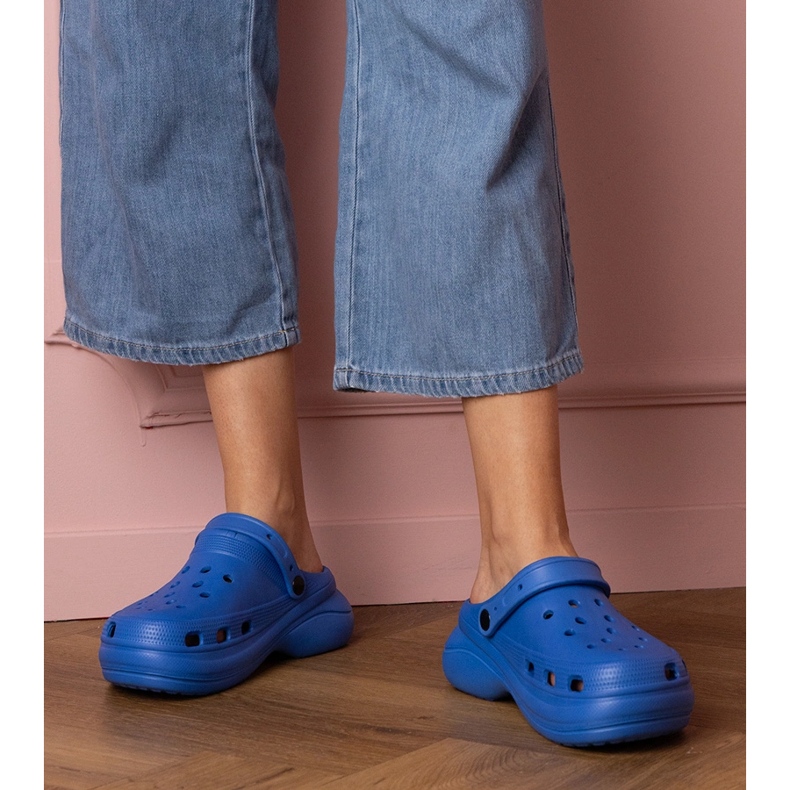 Blue built -up flip flops on the platform 1