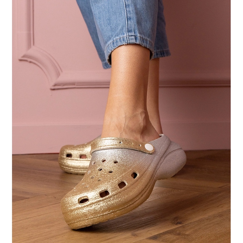 Gold-silver built-up flip-flops on the platform 1