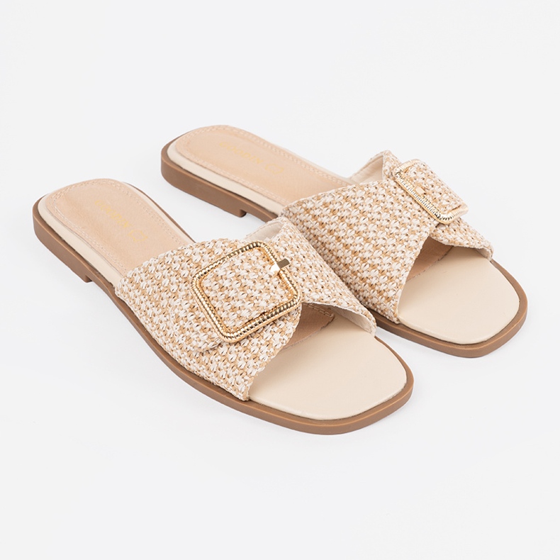 Goodin Slippers in a beige and white grille with a buckle 1