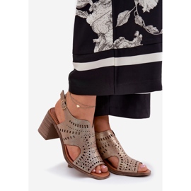 Openwork women's sandals on the golden post 1