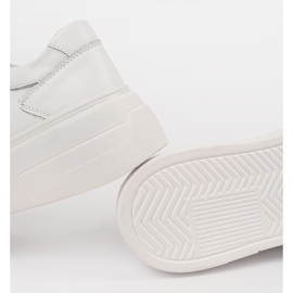 White sneakers on the Sergio Leone leather platform 1 White sneakers on the Sergio Leone leather platform 1