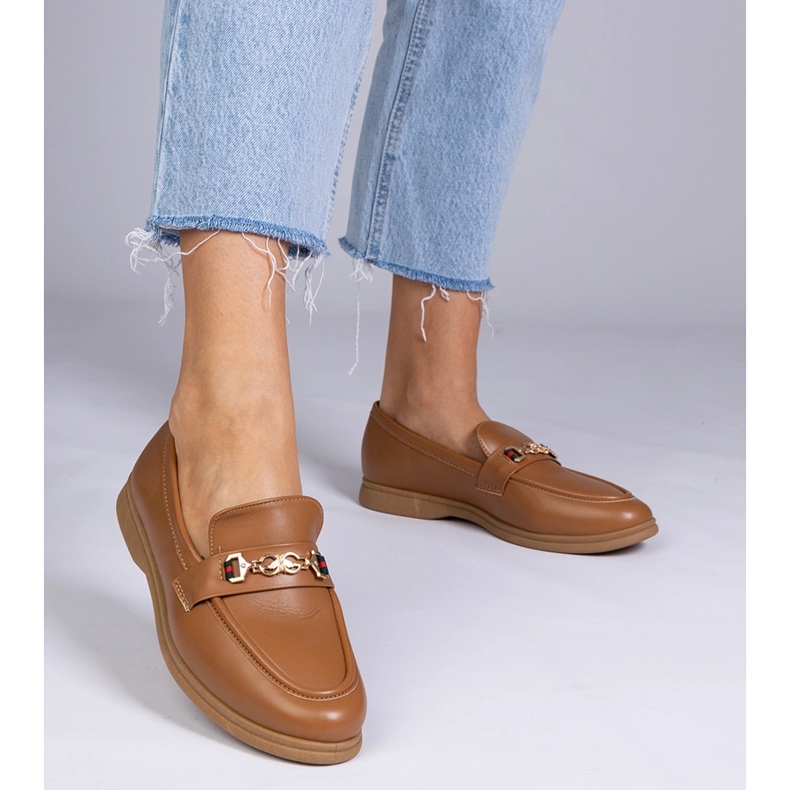 Dark brown loafers with a golden decoration 1