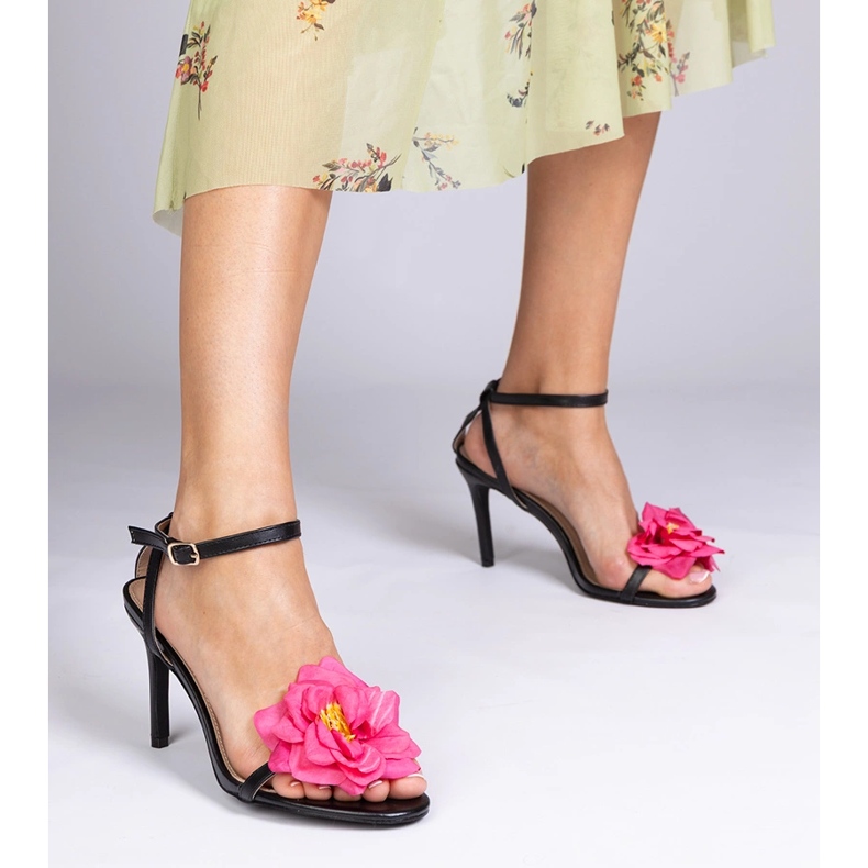 Black sandals on a heel decorated with a flower 1