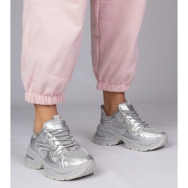 Silver sports sneakers on a thick sole 1