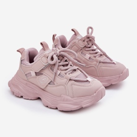 Children's sneakers on the pink platform 1
