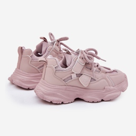 Children's sneakers on the pink platform 2