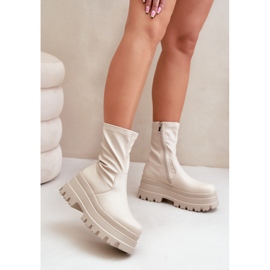 Light beige ankle boots on a massive platform 2