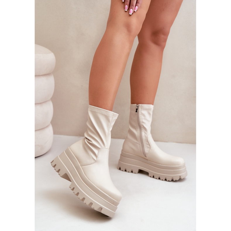Light beige ankle boots on a massive platform 2