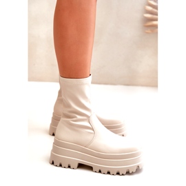 Light beige ankle boots on a massive platform 4