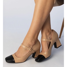 Beige women's pumps with a black nose 1 Beige women's pumps with a black nose 1