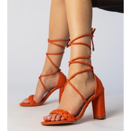 Orange sandals on the post 1