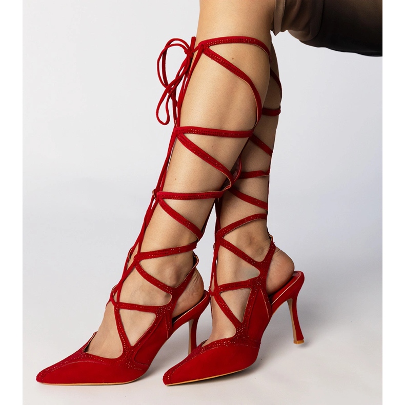 Red sandals on a high heel tied with zircons 2