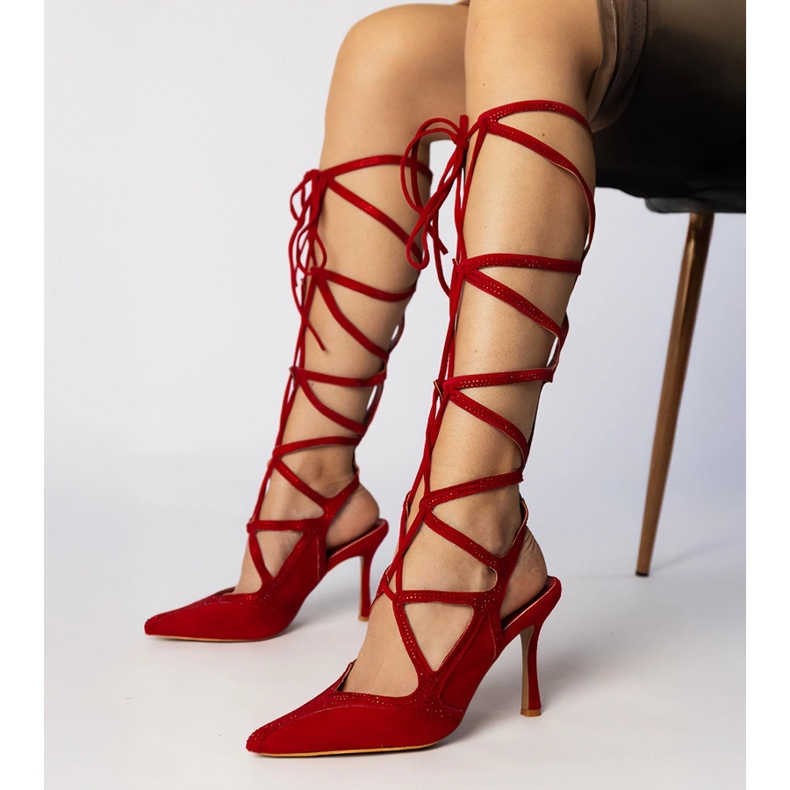 Red sandals on a high heel tied with zircons 1
