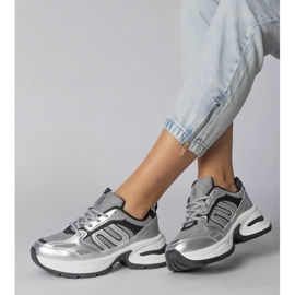 Silver sports sneakers on a massive sole 1