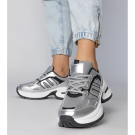 Silver sports sneakers on a massive sole 2