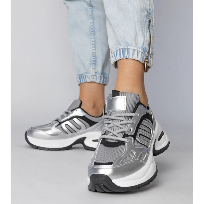 Silver sports sneakers on a massive sole 2