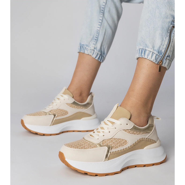 Beige sports sneakers with a braided insert 1
