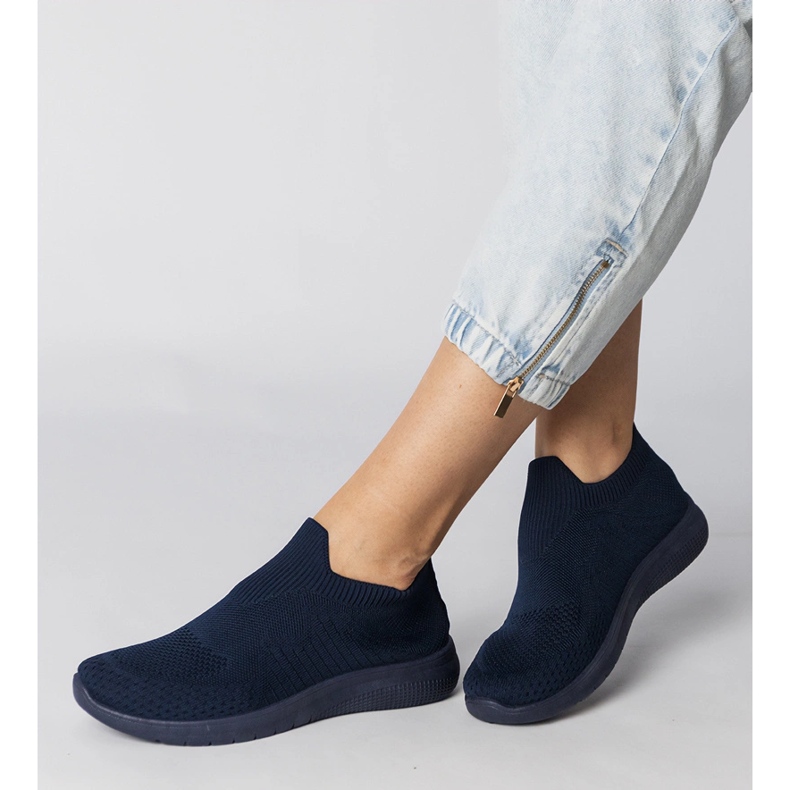 Navy blue sports sneakers with a socking upper 1