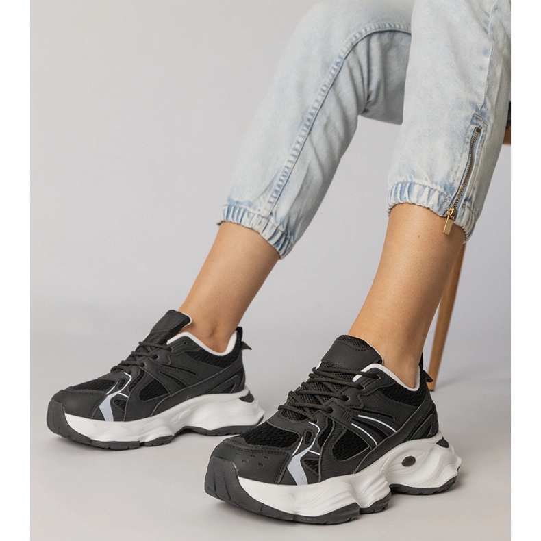 Black sports sneakers on a massive sole 1