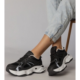 Black sports sneakers on a massive sole 2