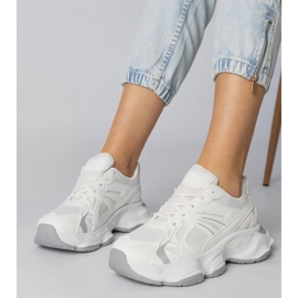 White sports sneakers with a massive sole 1 White sports sneakers with a massive sole 1