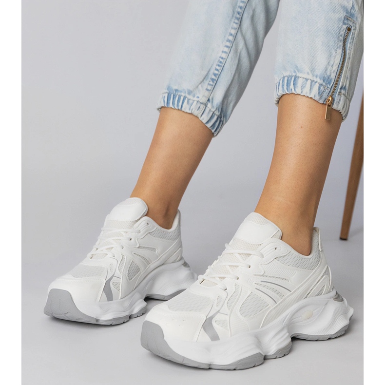 White sports sneakers with a massive sole 1 White sports sneakers with a massive sole 1