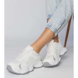 White sports sneakers with a massive sole 2 White sports sneakers with a massive sole 2