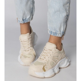 Beige sports sneakers on a massive sole 2