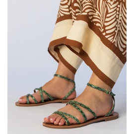 Green sandals on a flat sole 1