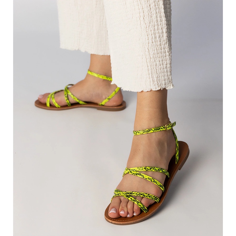 Yellow sandals on a flat sole 2