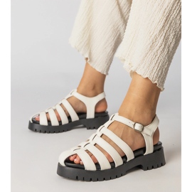 White sandals on the platform with a finger line 1