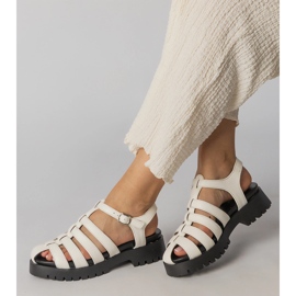 White sandals on the platform with a finger line 2