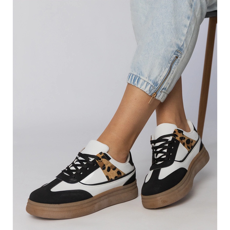 White and white sneakers with a leopard accessory 2
