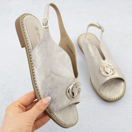 Women's sandals built up with an ornament of golden 43329 Potocki 1