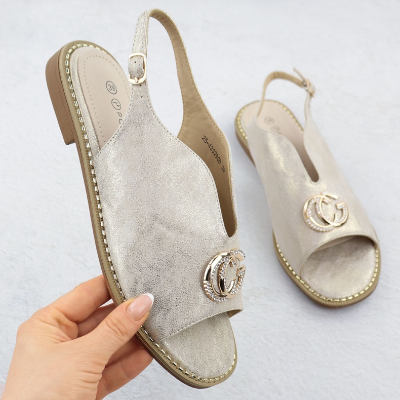 Women's sandals built up with an ornament of golden 43329 Potocki 1