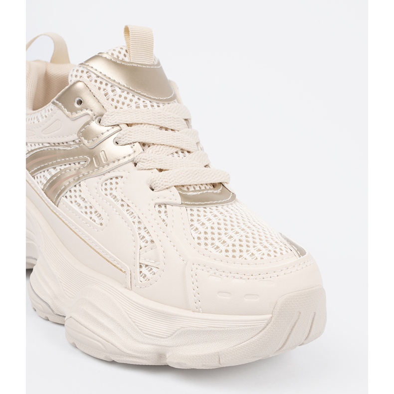 Light beige sneakers on a thick sole 1 Light beige sneakers on a thick sole 1
