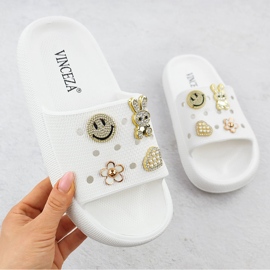 Foam flip flops on the pool beach on the white platform decorated Vinceza 76055 1