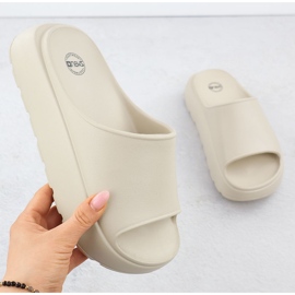 Women's flip flops on a thick platform pool beige news 7303 1