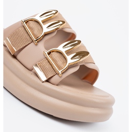 Seastar Slippers with golden buckles on the beige platform 2