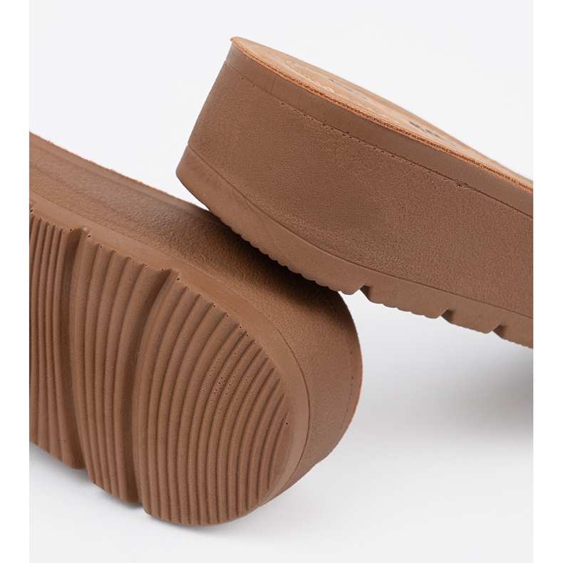 Seastar Black flip flops decorated with a golden clamp 1 Seastar Black flip flops decorated with a golden clamp 1