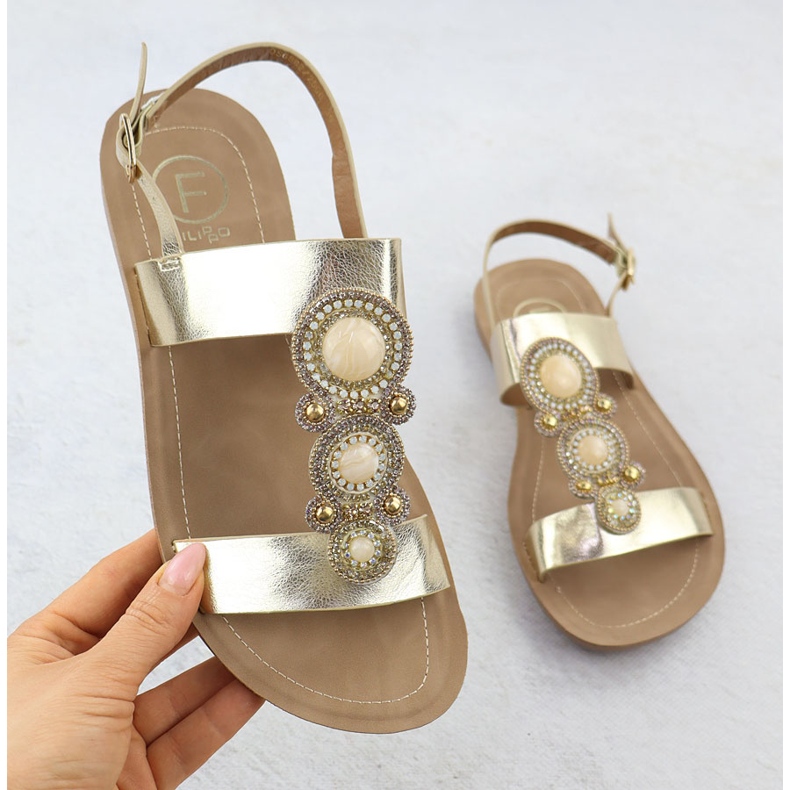 Flat women's sandals with a golden metallic ornament Filippo DS6882 1