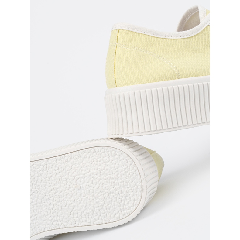 Shelvt Yellow laced sneakers on a thick sole 1