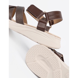 Sergio Leone Brown sandals on a white platform 1 Sergio Leone Brown sandals on a white platform 1