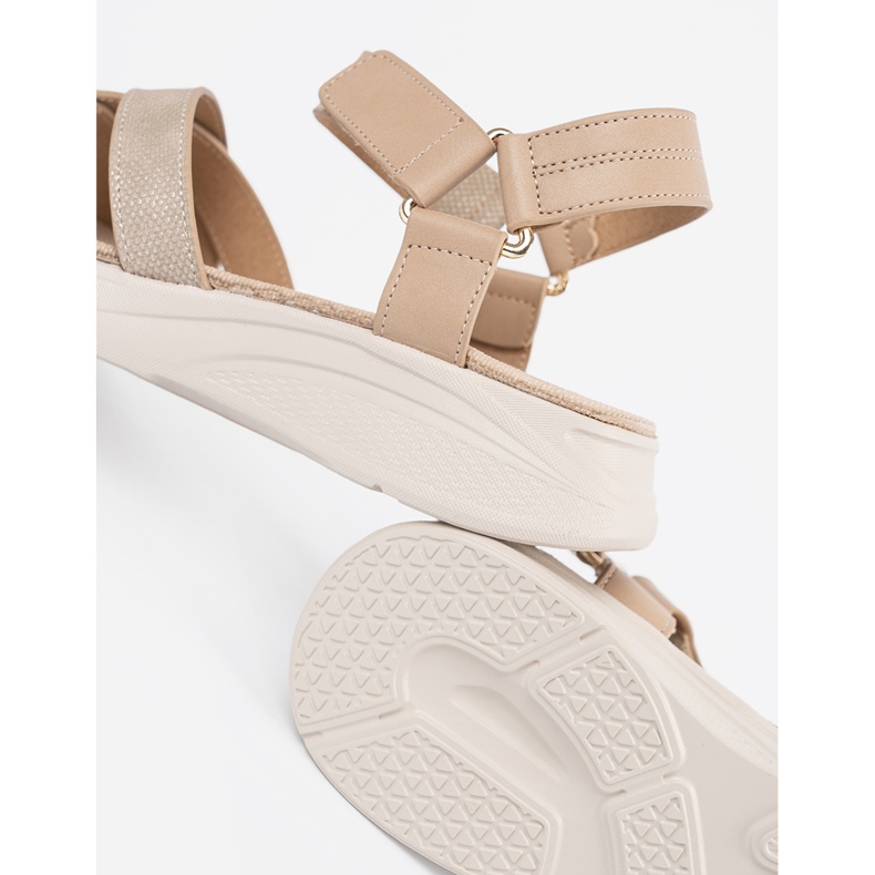 Sergio Leone Light beige sandals on a white platform 1